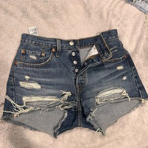 Levi’s 501 distressed woman’s high rise Jean shorts
